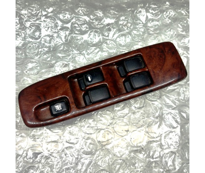 MASTER WINDOW SWITCH AND TRIM FOR A MITSUBISHI V60,70# - FRONT DOOR TRIM & PULL HANDLE