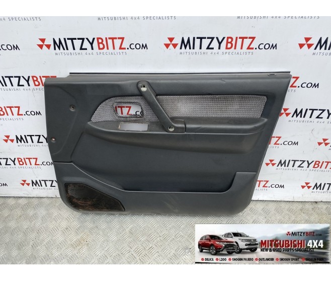FRONT RIGHT DOOR CARD( GREY CLOTH ) FOR A MITSUBISHI PAJERO - V26W