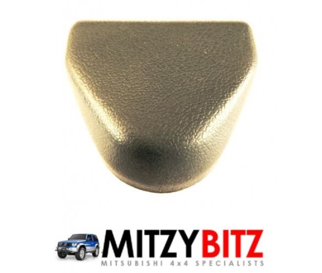 GREY SEAT BELT BOLT COVER FOR A MITSUBISHI L200 - K62T
