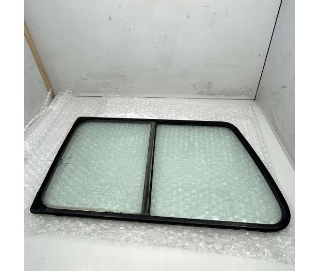 REAR L/H SLIDING GLASS WINDOW FOR A MITSUBISHI V20,40# - QTR WINDOW GLASS & MOULDING