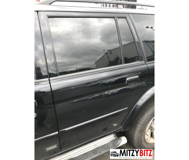 REAR LEFT BLACK DOOR PANEL ONLY FOR A MITSUBISHI MONTERO SPORT - K99W