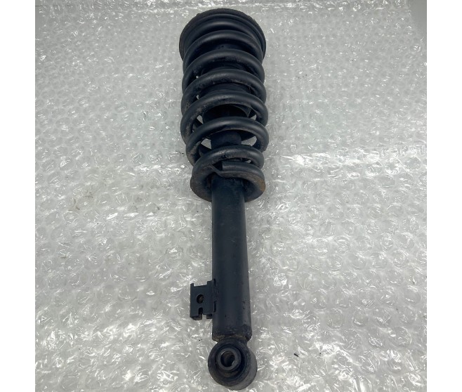 FRONT SUSPENSION STRUT AND COIL SPRING FOR A MITSUBISHI L200 - KB4T