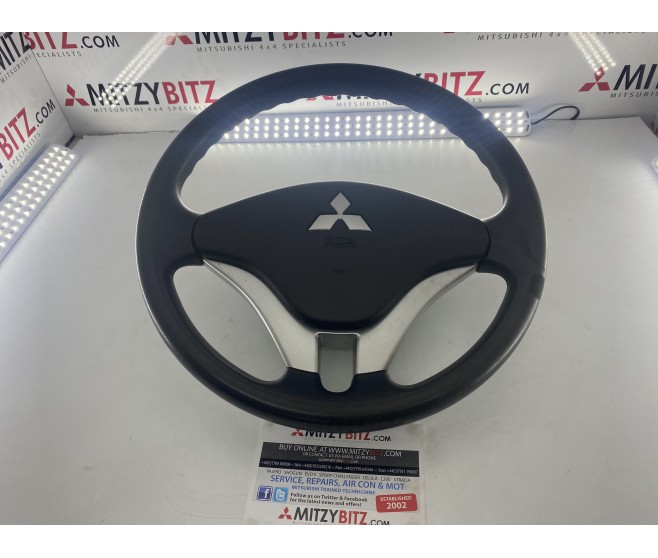 STEERING WHEEL WITH AIRBAG FOR A MITSUBISHI L200 - KB4T