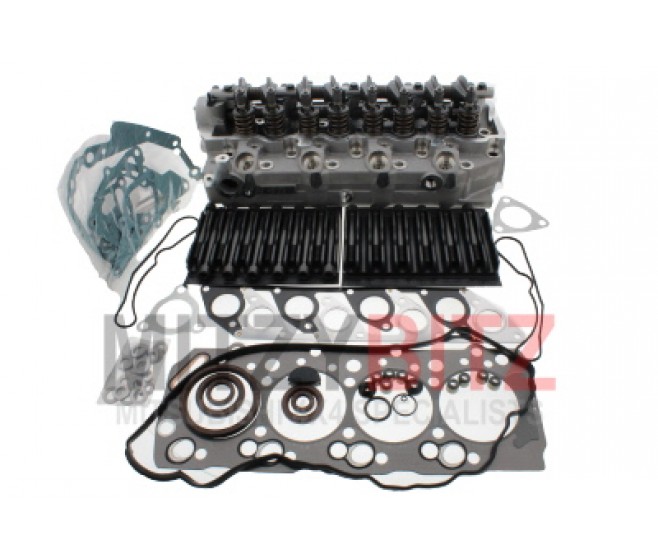 CYLINDER HEAD WITH GASKET SET AND BOLTS FOR A MITSUBISHI ENGINE - 