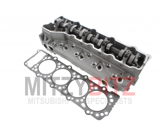 BUILT UP CYLINDER HEAD AND GASKET FOR A MITSUBISHI ENGINE - 