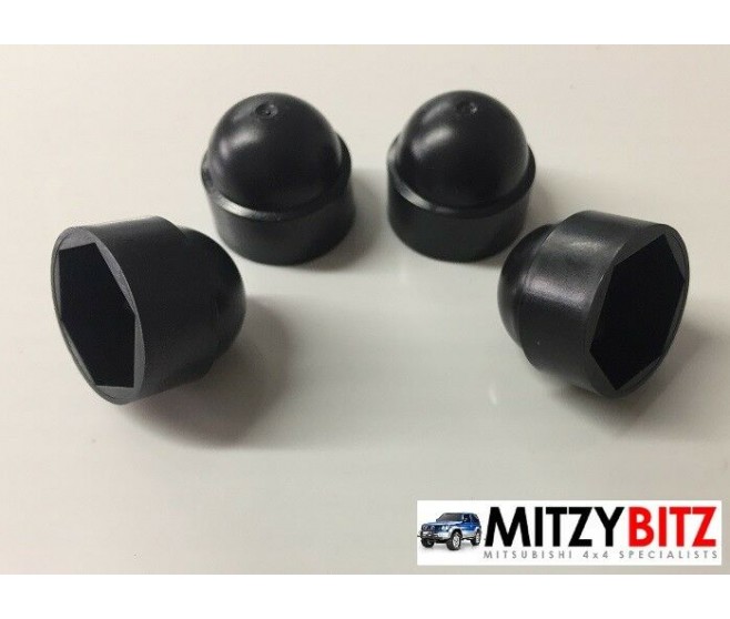 TOWING EYE BOLTS PLASTIC COVER CAPS FOR A MITSUBISHI PAJERO - V46WG
