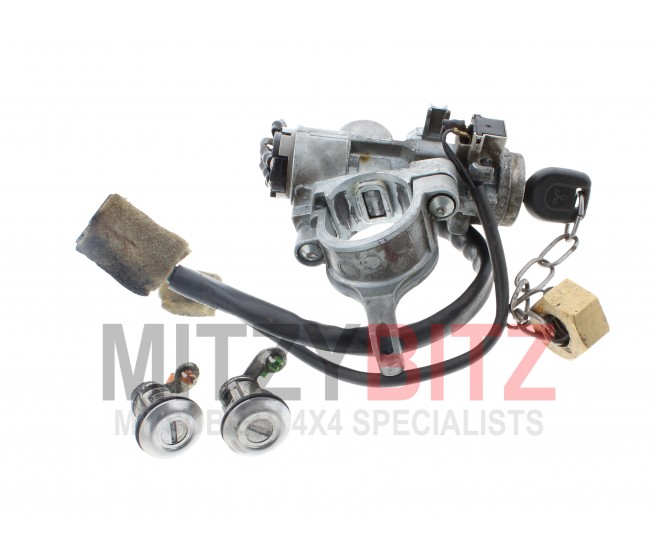 IGNITION BARREL WITH CASTING, KEY AND 2 DOOR LOCKS FOR A MITSUBISHI L200 - K74T